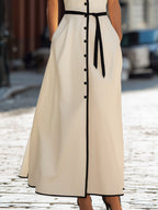 Structured Button-Front Peplum Top With Sculpted Waist